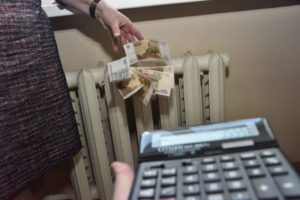 При покупке квартиры долг за отопление